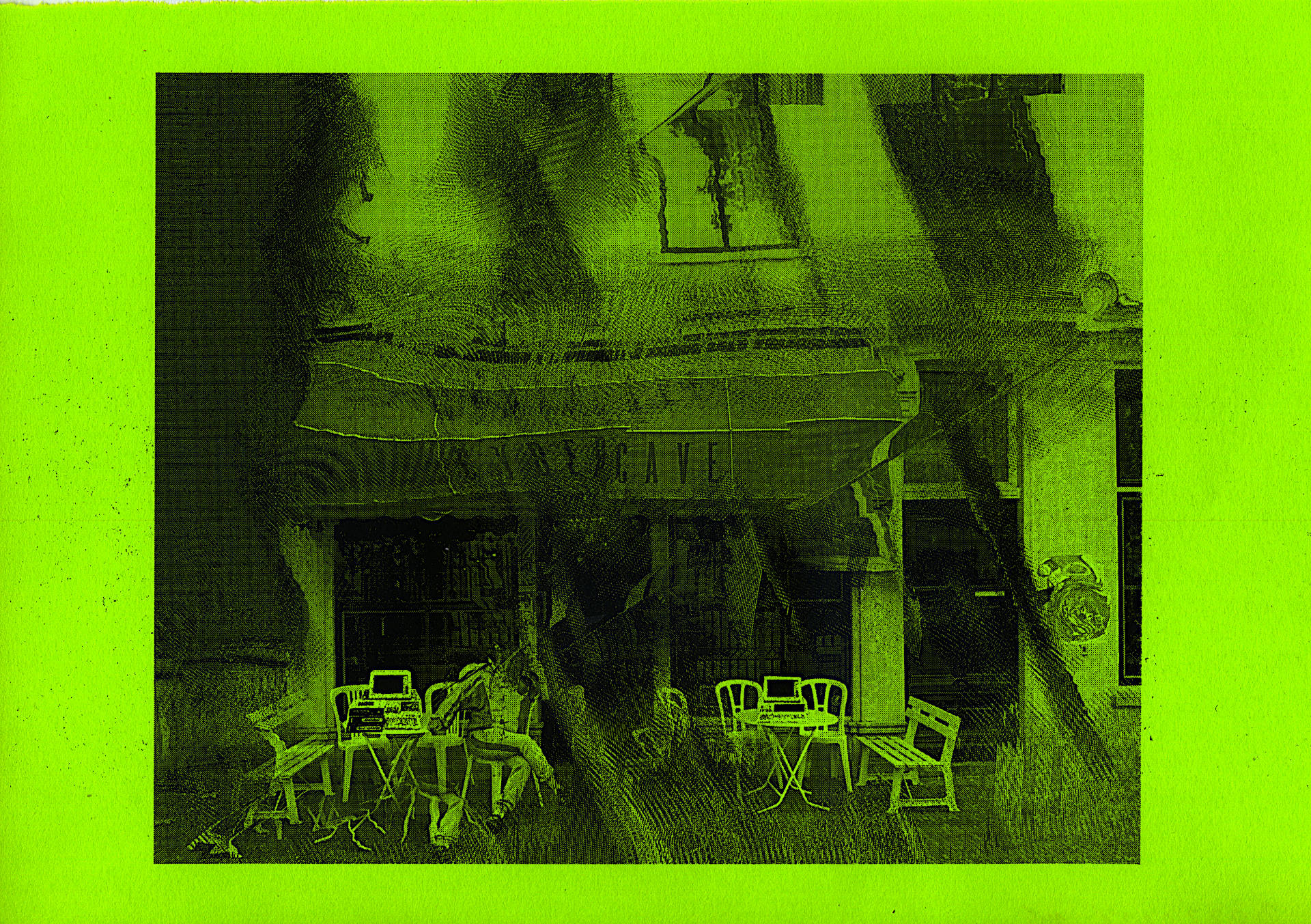 black laser print on green neon paper. A person wearing a training suit is sitting in a plastic chair outside a cafe. The cafe name CYBERCAVE is written on its marquise. Old desktop computers wait for more visitors on the tables outside.