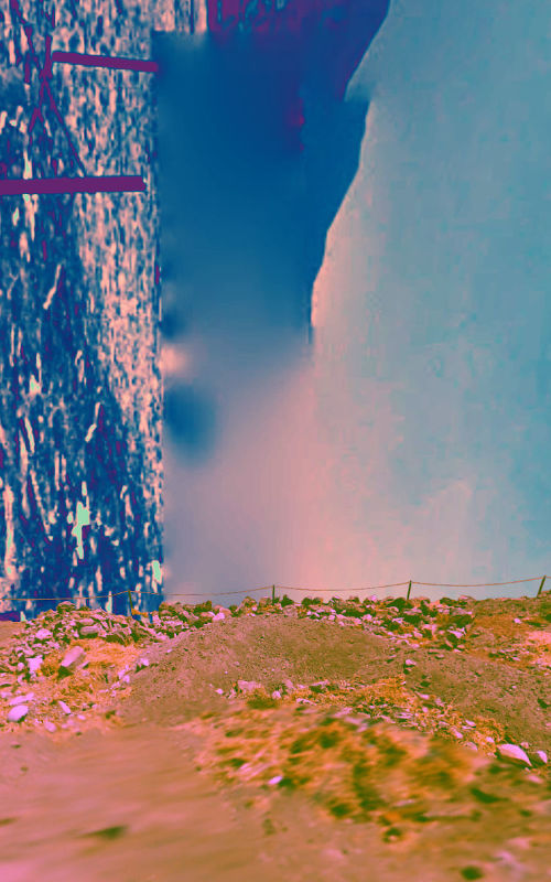 streetview ruins, digital collage, an empty field with some rocks, cordoned off with a rope in front of a mountain skyline, that has been rotated by 90°