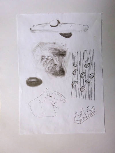 Drawing of various objects. One is stuck to another object, small objects are attached to strings, next object drawn like an animal head, some drawer object and unclear smeary shadows.