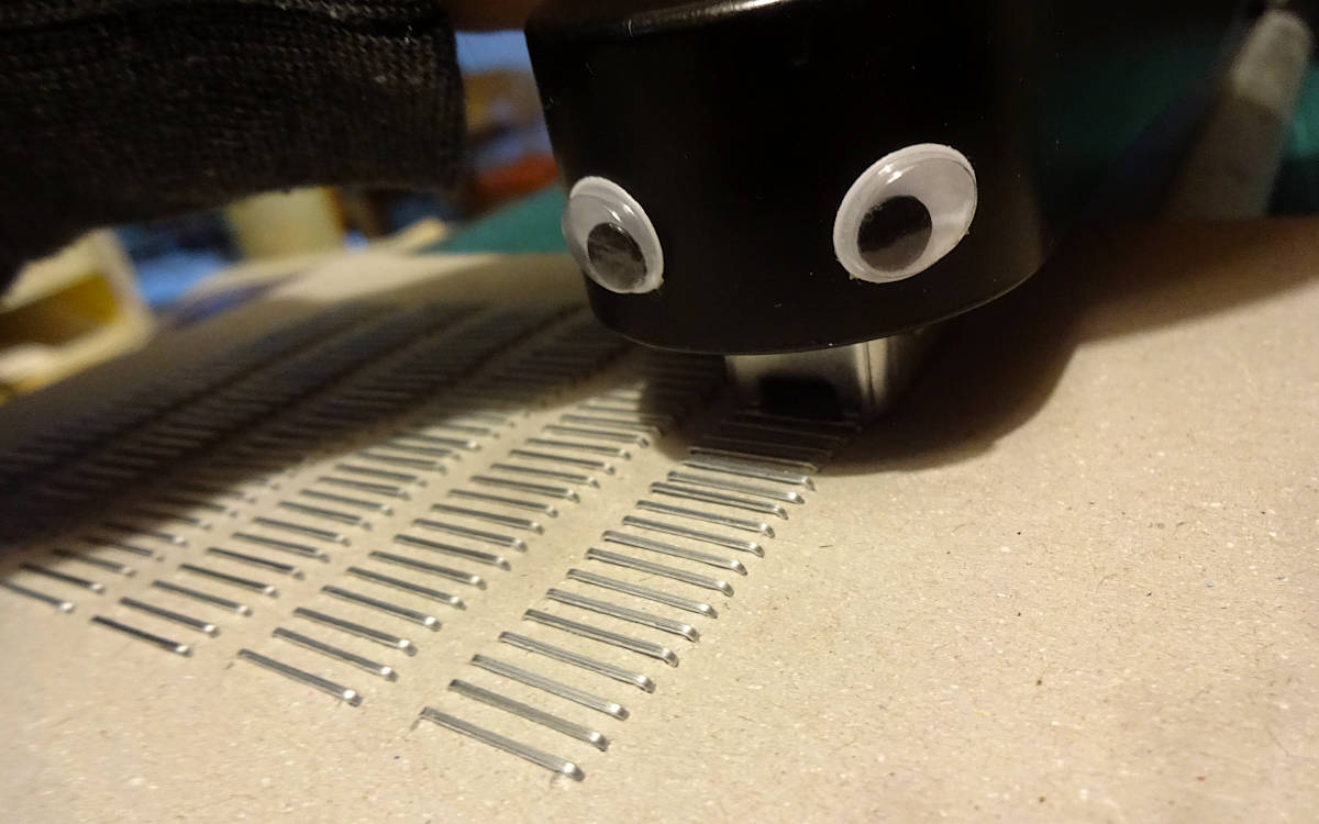 my stapler has attached googly eyes at the fron, so it looks like it’s munchin’ the paper.