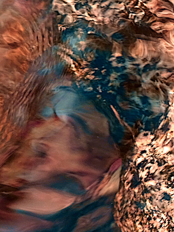 water flow in a river. digital photography with false colors.